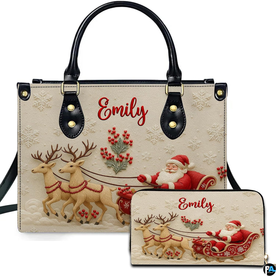 Holiday handbag and matching wallet featuring carved Santa in red sleigh pulled by two reindeer on ivory.