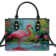 Angled display highlighting the tropical foliage and wading flamingo.