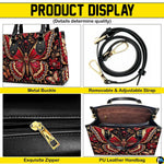 Bottom view of crimson butterfly handbag showing protective gold base hardware