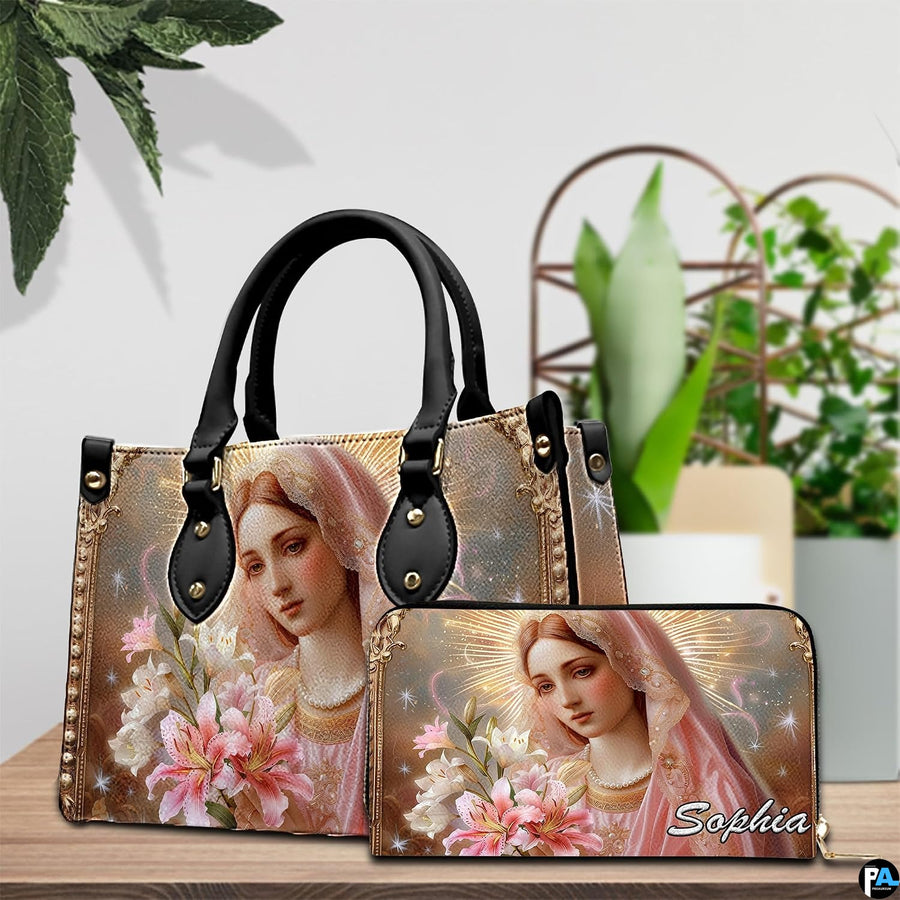 Matching Virgin Mary handbag and wallet set displayed in elegant interior