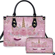 Sparkling rose unicorn handbag and matching wallet set featuring sleeping unicorn face on pink glitter.