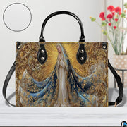 Angle view showcasing baroque golden flourishes and celestial blue drapery on the handbag.