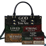 Front view of western colorblock patchwork handbag and matching wallet with tooled scrollwork corners.
