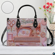 Direct frontal perspective highlighting rose gold sewing machine artwork and script lettering.