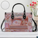 Direct frontal perspective highlighting rose gold sewing machine artwork and script lettering.
