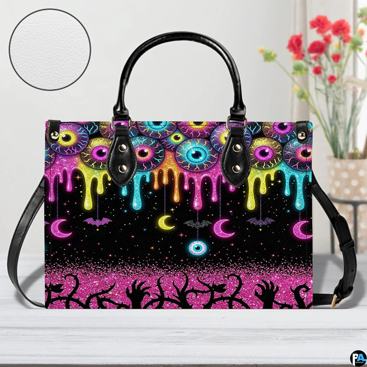 Neon eyeball slime drip handbag displayed alone on white background.