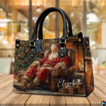 Perspective angle showing detailed fireside Santa Claus print on holiday handbag