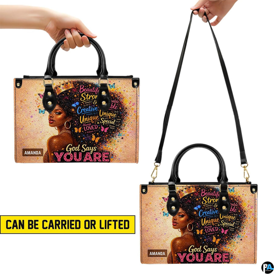 Two carry views of afro queen handbag with butterfly artwork