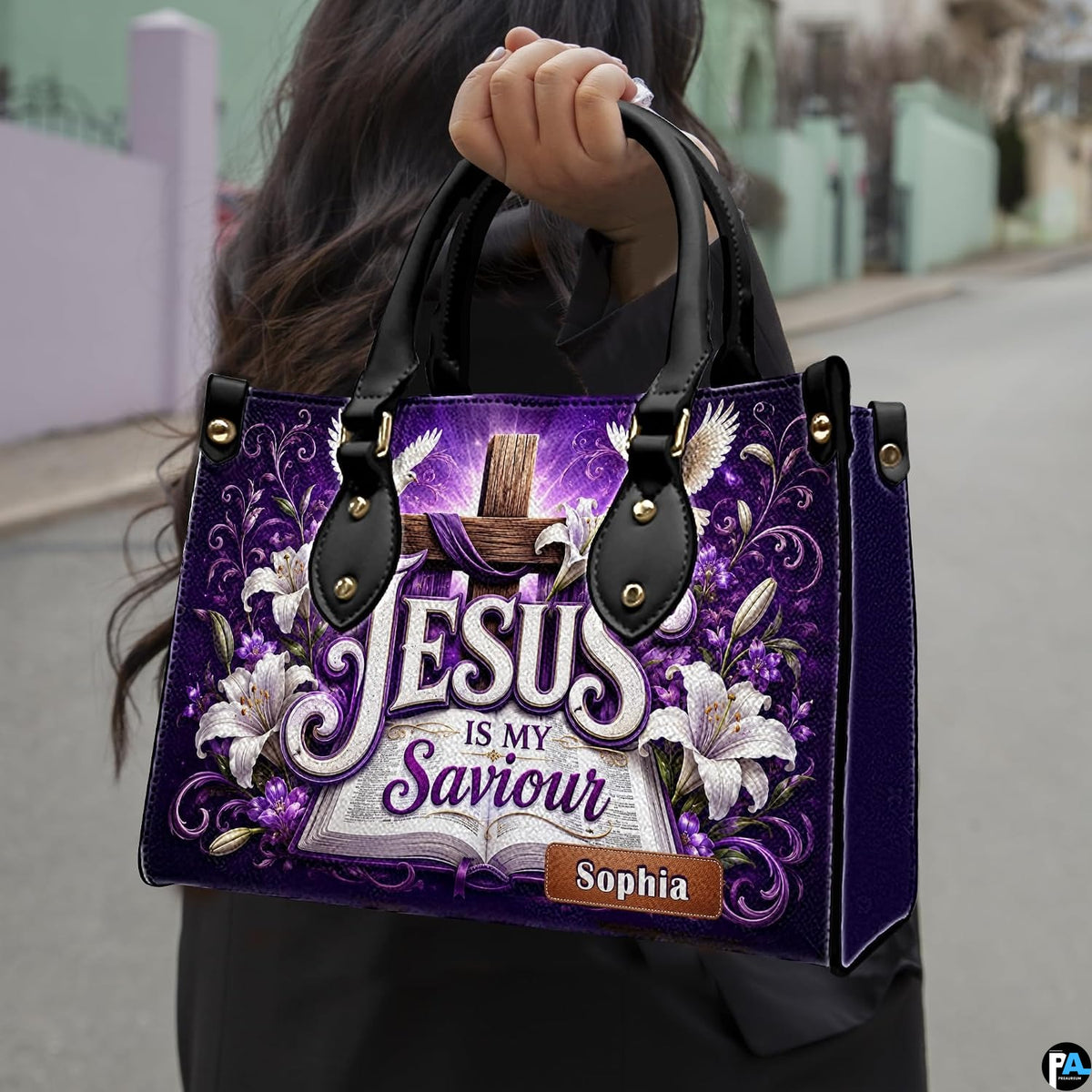 Woman carrying purple Christian cross and Easter lily handbag outdoors in natural light.