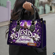 Woman carrying purple Christian cross and Easter lily handbag outdoors in natural light.