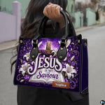 Woman carrying purple Christian cross and Easter lily handbag outdoors in natural light.