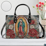 Handbag displayed outdoors in daylight showing shimmering gold filigree roses.