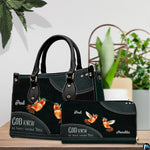 Angled display showing hummingbird couple handbag beside matching personal organizer