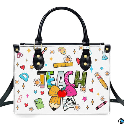 Colorful school stationery teacher handbag featuring patterned lettering, pencil bow, and doodles.