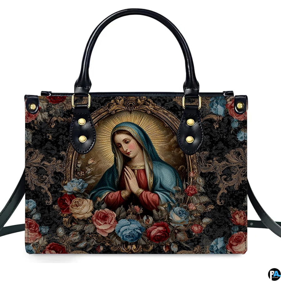 Front view of handbag featuring praying Madonna portrait inside ornate gilded oval rococo border.