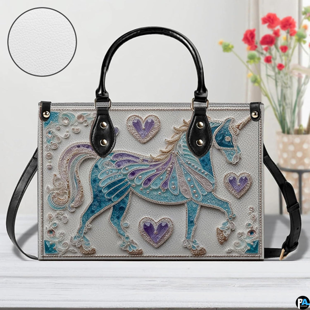 Side profile view showing structured silhouette and black carrying handles of the handbag.