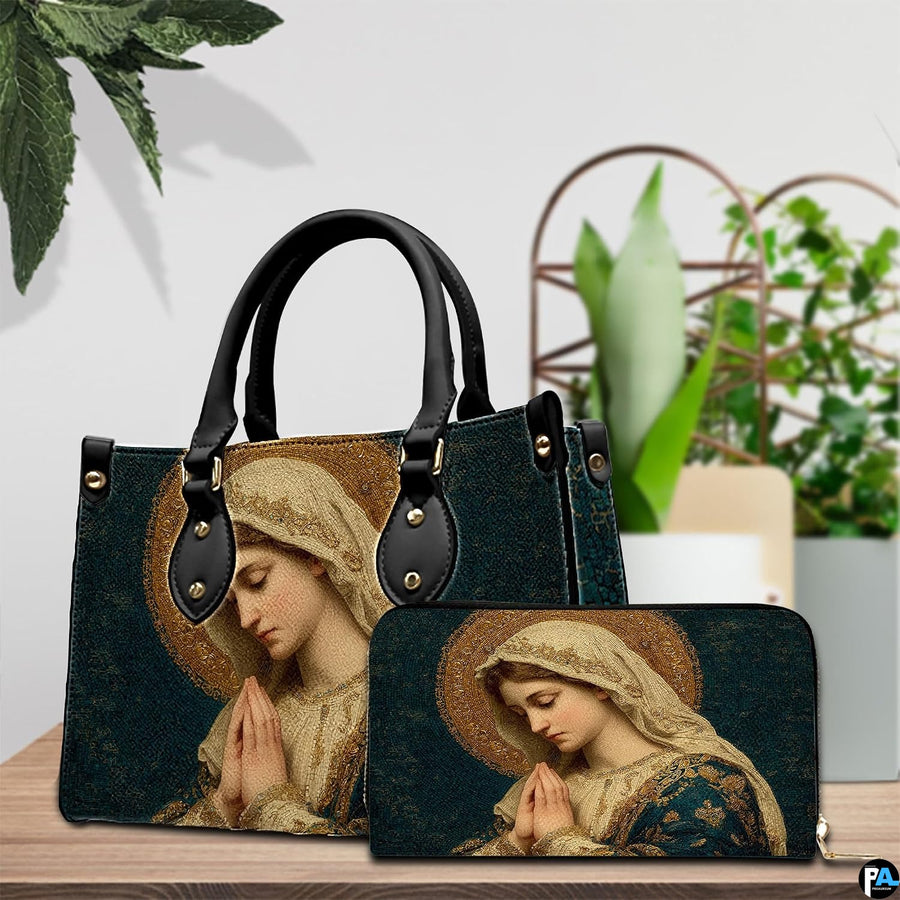 Devotional mosaic handbag and matching wallet staged on wooden table next to potted plant