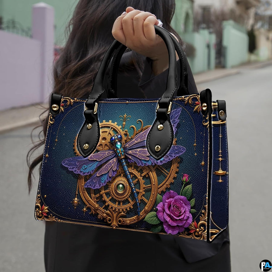 Three-quarter view of purple steampunk dragonfly purse highlighting side and handles