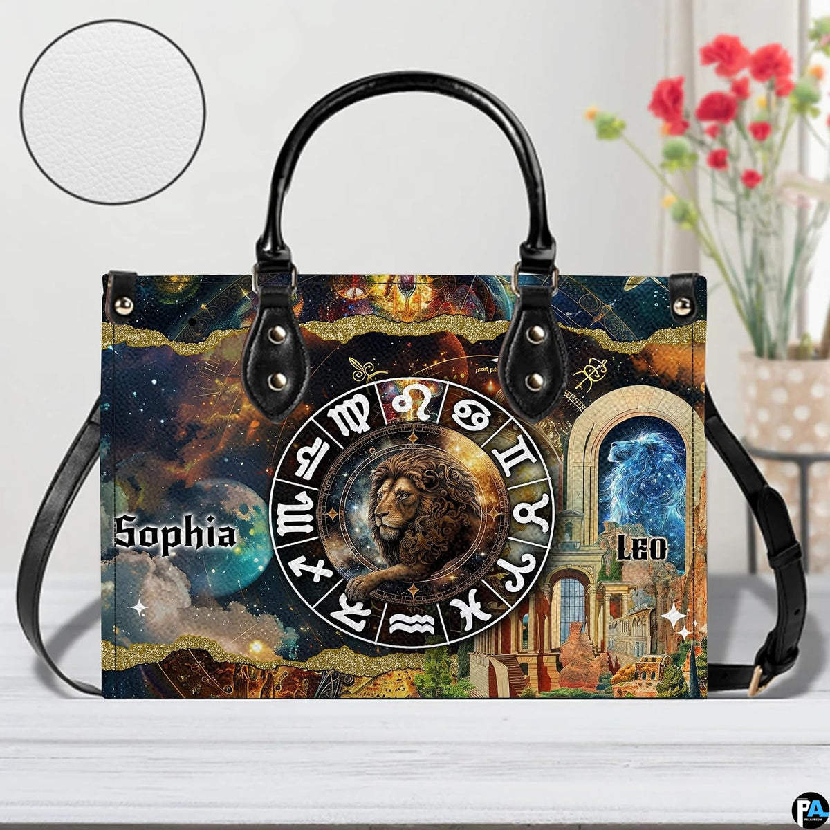 Celestial Lion Satchel Handbag resting on a white table beside floral bouquet with texture inset.