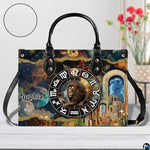 Celestial Lion Satchel Handbag resting on a white table beside floral bouquet with texture inset.