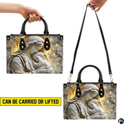 Graphic illustrating top handle carrying and shoulder strap wear options for the handbag.