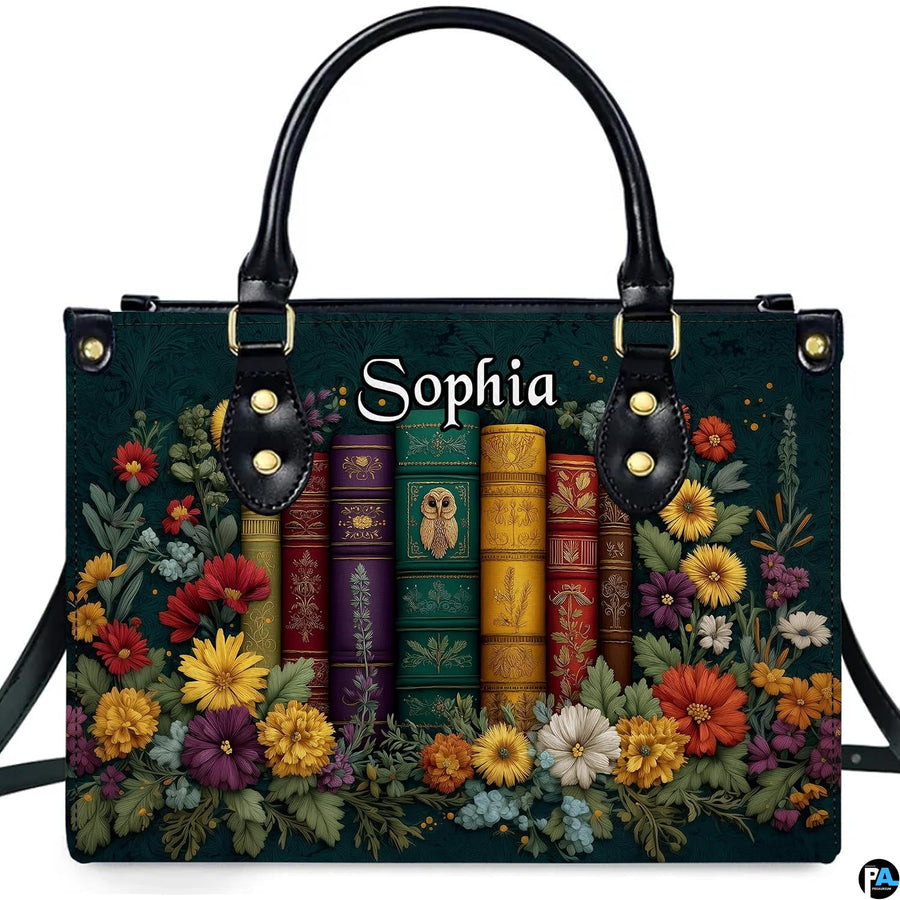 Front view of Golden Owl Library Books Handbag with embossed owl emblem and floral garland
