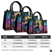 Stained glass Halloween witch magic staff handbag shown alone on white background.