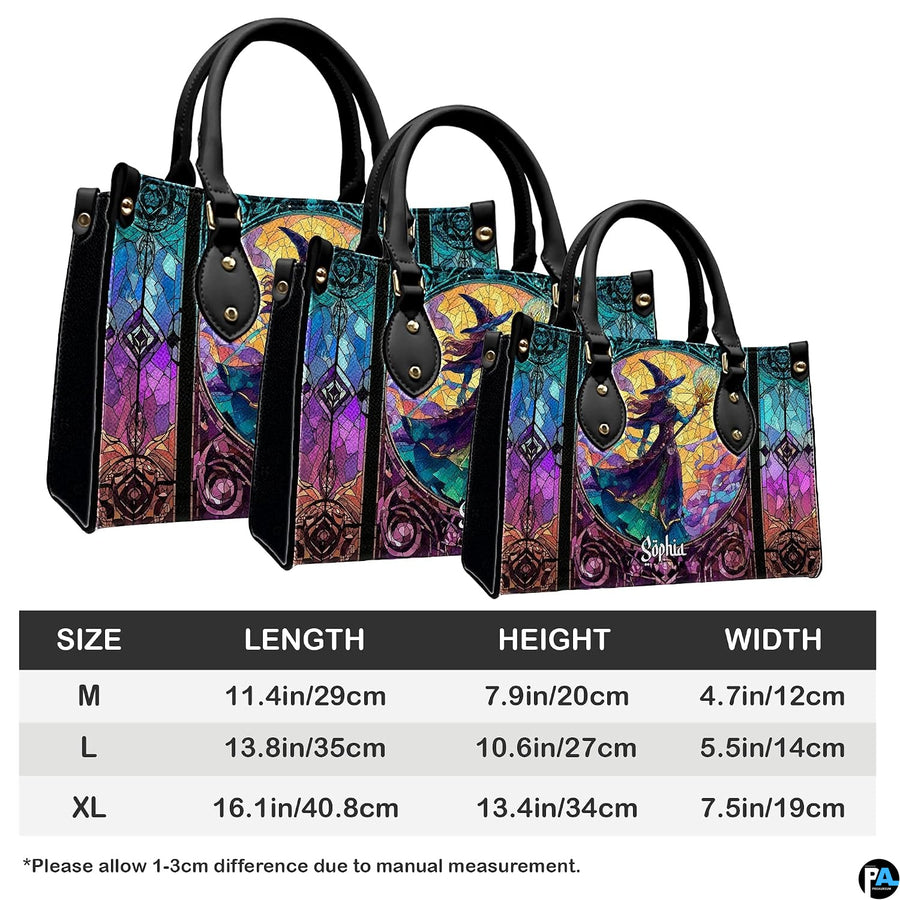 Stained glass Halloween witch magic staff handbag shown alone on white background.