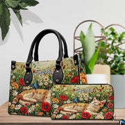 Tabletop display featuring cat butterfly art meadow print accessory resting beside potted plant.