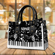 Studio showcase of monochrome piano keys artwork placed on wooden surface.