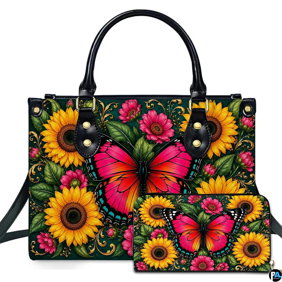 Studio presentation of pink butterfly and sunflower artwork alongside matching companion accessory on white surface.