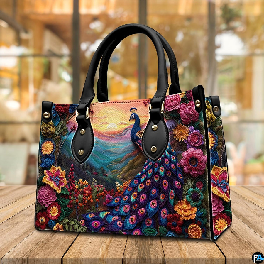 Front view of a colorful peacock floral handbag on a wooden table