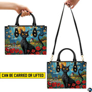 Carrying method showcase illustrating dual handheld and over-shoulder display options for van gogh cat art.