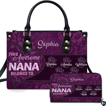 Purple floral heart handbag and matching zip wallet displayed against studio background with botanical details.