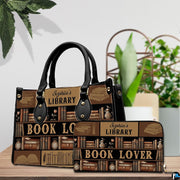 Model holding the vintage library handbag outdoors displaying the antique bookshelf artwork.