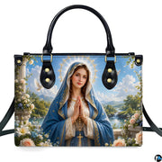 Pastoral Virgin Mary handbag displayed with matching continental wallet