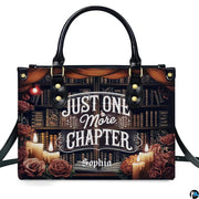 Front view of library bookshelf handbag displaying glowing candlelight and dusty roses.