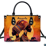 Direct studio front view of the two women profiles and savanna sunset artwork on a neutral surface.