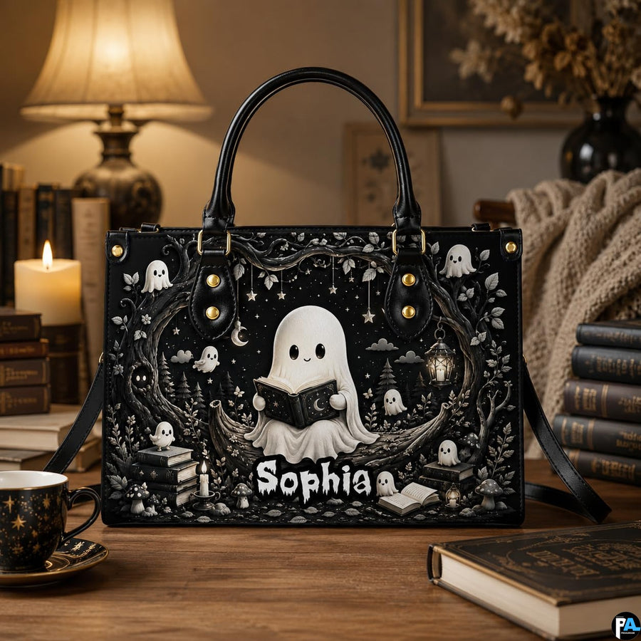 Tabletop perspective of bookish ghost satchel set beside vintage books and candlelight.