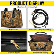 Detailed view of metal buckles, smooth zipper closure, and interior compartment
