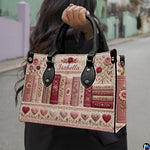 Angled view displaying the romantic floral book spine artwork printed across the handbag.