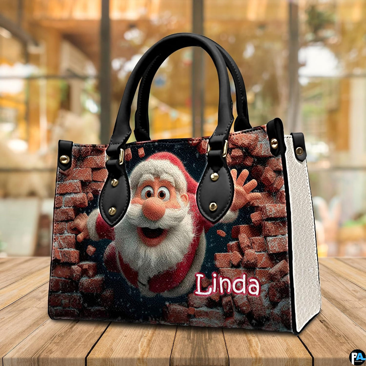 Festive cartoon Santa handbag presented on outdoor wooden table in front of cafe window.