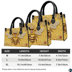 Coordinated arrangement of bee handbag and wallet highlighting unified golden theme.