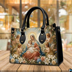 Tabletop display of Renaissance Madonna handbag highlighting rich oil painting tones and cherubs