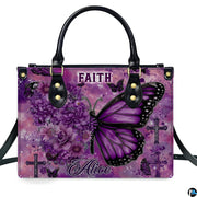 Angled perspective view of purple floral butterfly cross handbag showing dimensional artwork.