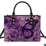 Angled perspective view of purple floral butterfly cross handbag showing dimensional artwork.