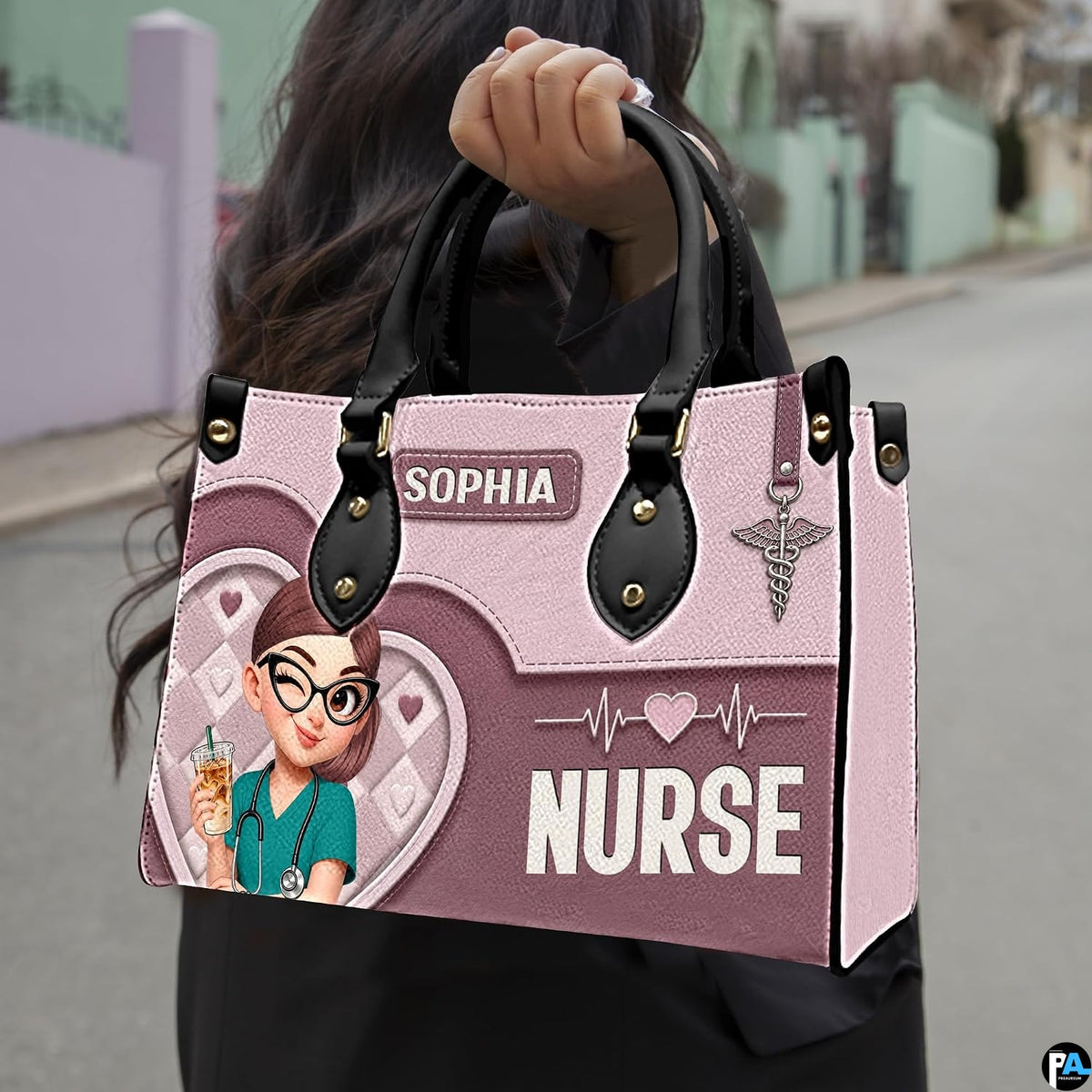 Chibi nurse pink quilted heart handbag carried outdoors showing visual scale against street setting.
