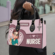 Chibi nurse pink quilted heart handbag carried outdoors showing visual scale against street setting.