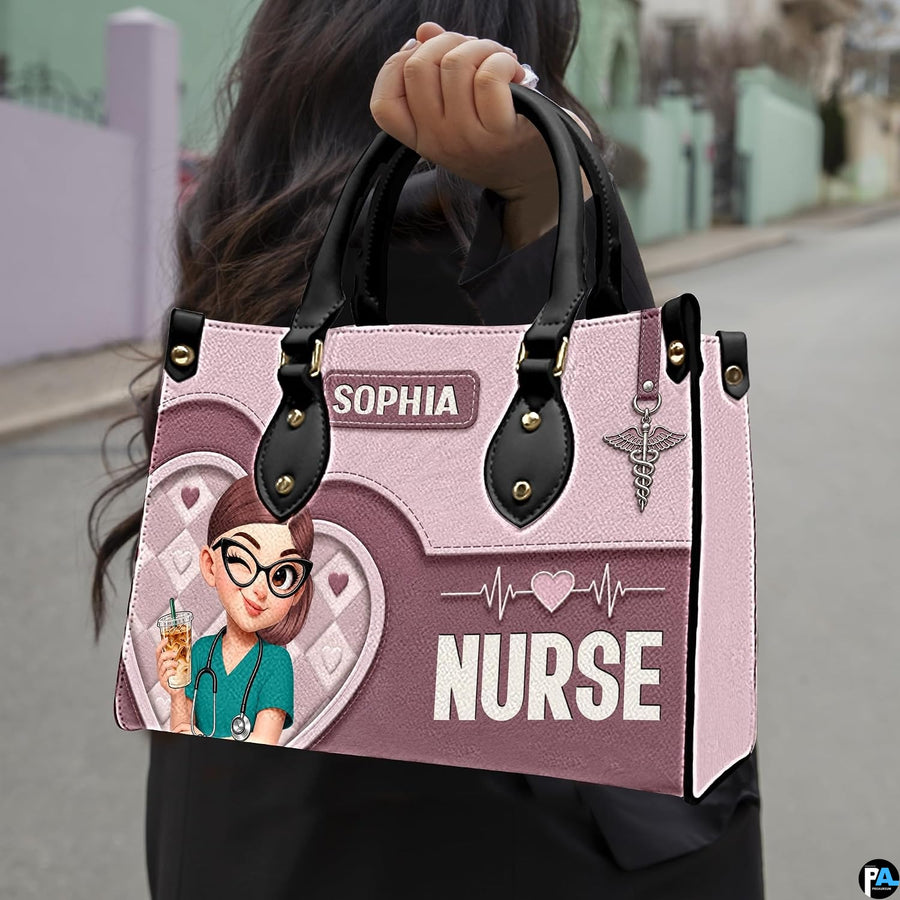 Chibi nurse pink quilted heart handbag carried outdoors showing visual scale against street setting.