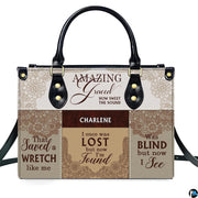 Detailed view of matching wallet featuring hymn typography and lace design